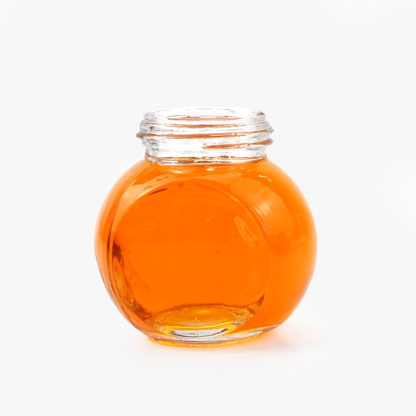 flat round glass honey jar (1)